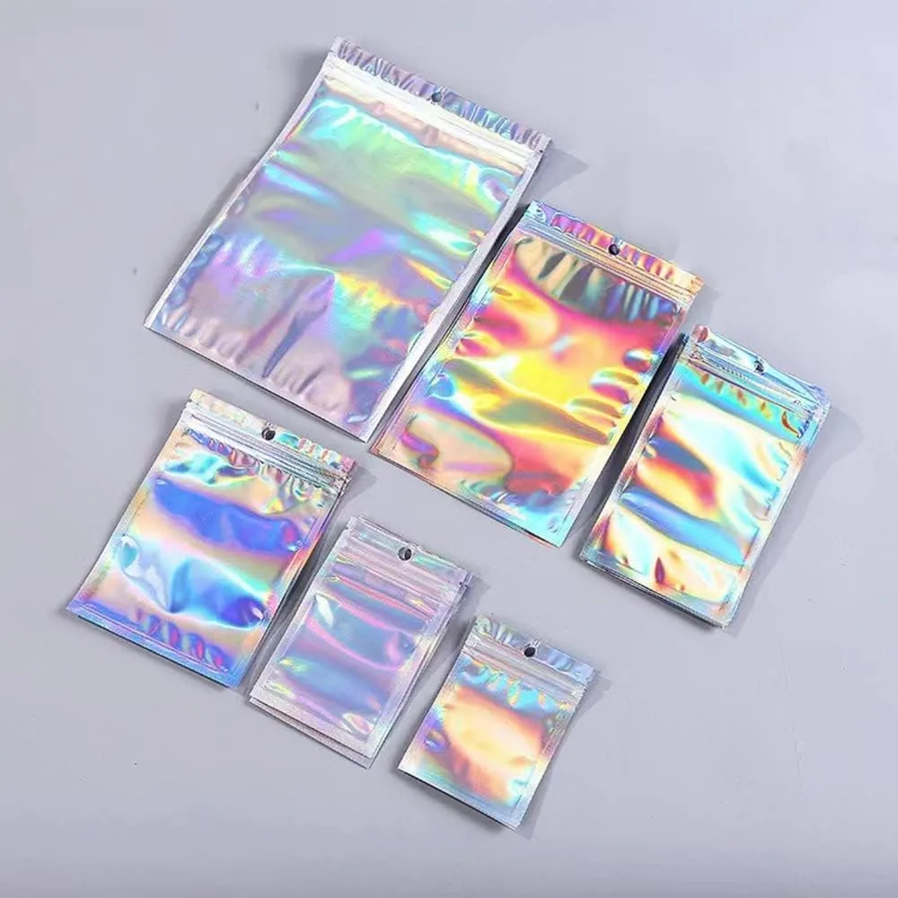 100 Pack Resealable Mylar Bags Smell Proof Pouch Aluminum Foil Packaging Plastic Ziplock Bag,Big Mylar Storage Bags For Candy,Jewelry,Screw,Holographic Rainbow Color,5.5 x 7.9 inch