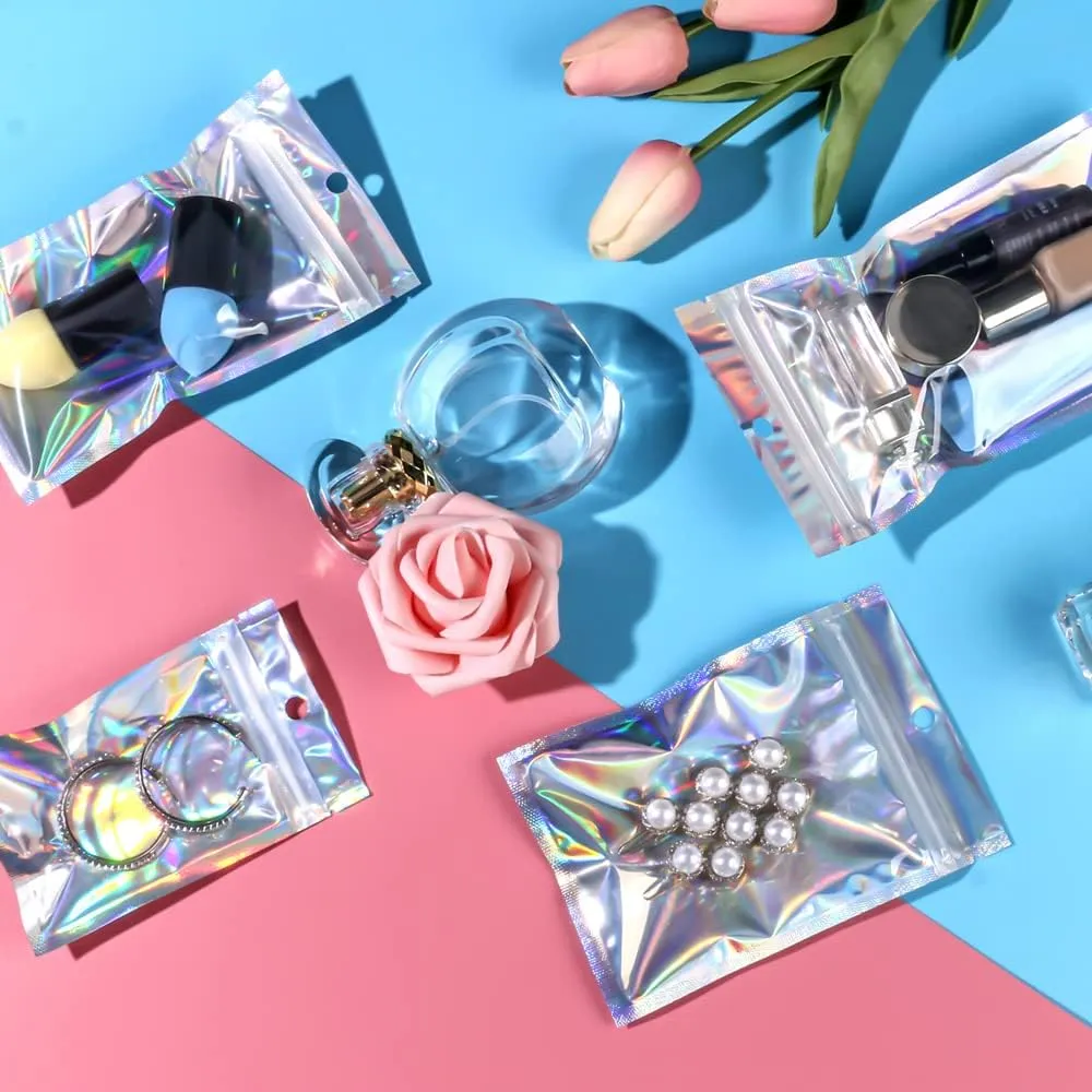 100 Pack Resealable Mylar Bags Smell Proof Pouch Aluminum Foil Packaging Plastic Ziplock Bag,Big Mylar Storage Bags For Candy,Jewelry,Screw,Holographic Rainbow Color,5.5 x 7.9 inch