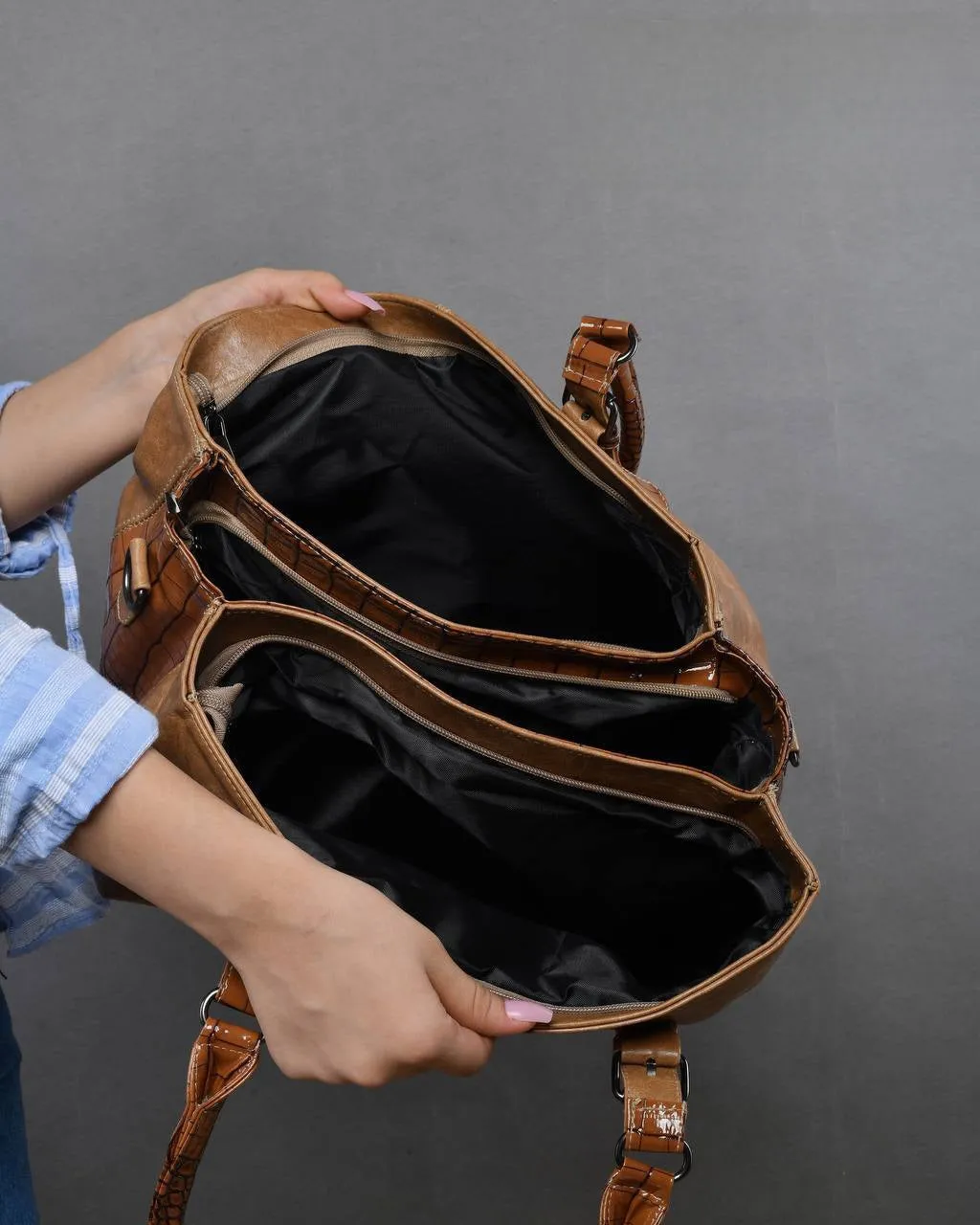 Brown bag with glossy brown accents