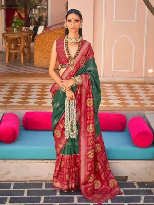 Dark Green Silk Patola Weeding Wear Saree with Red Border & Foil Print Design