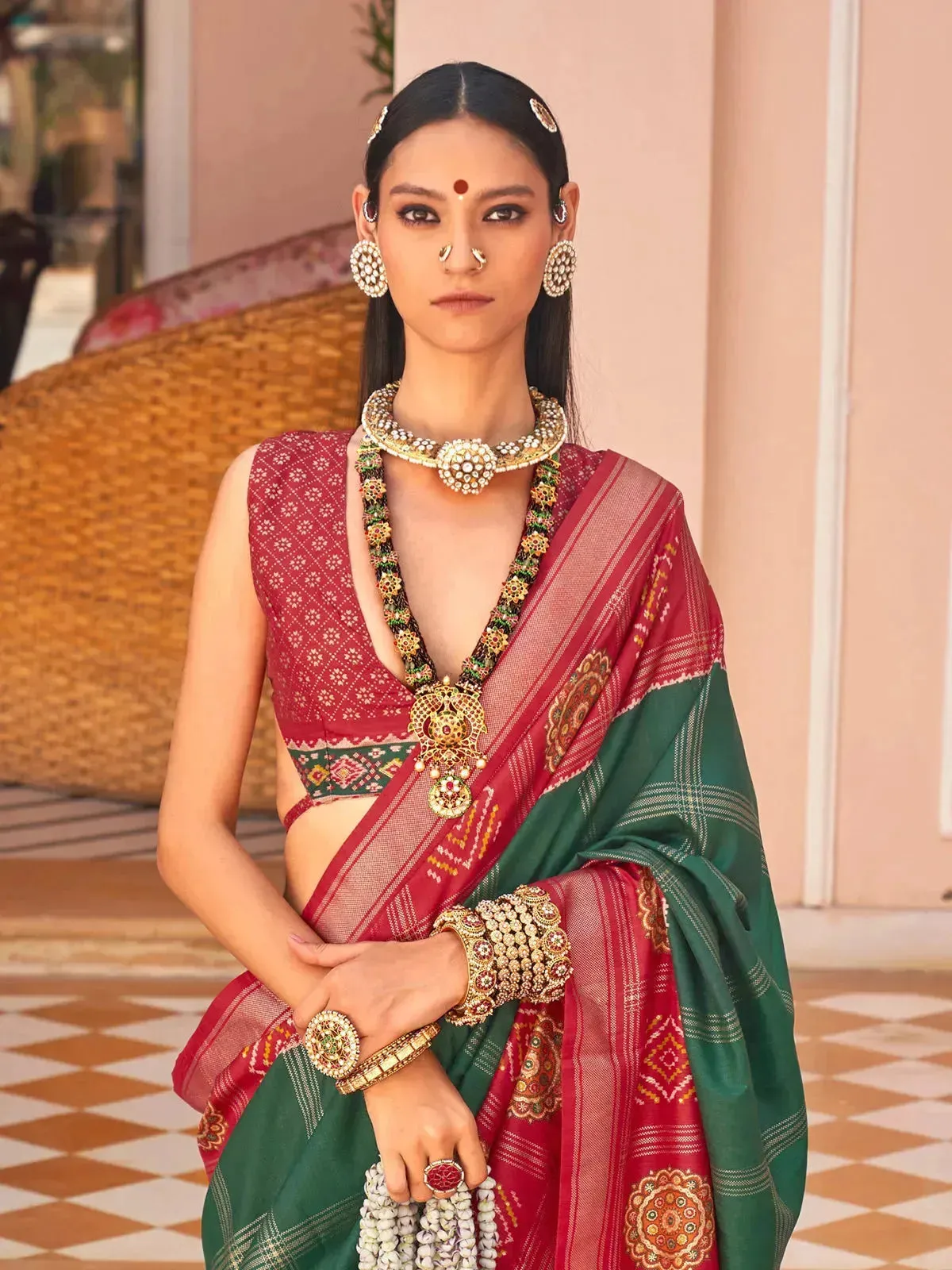 Dark Green Silk Patola Weeding Wear Saree with Red Border & Foil Print Design