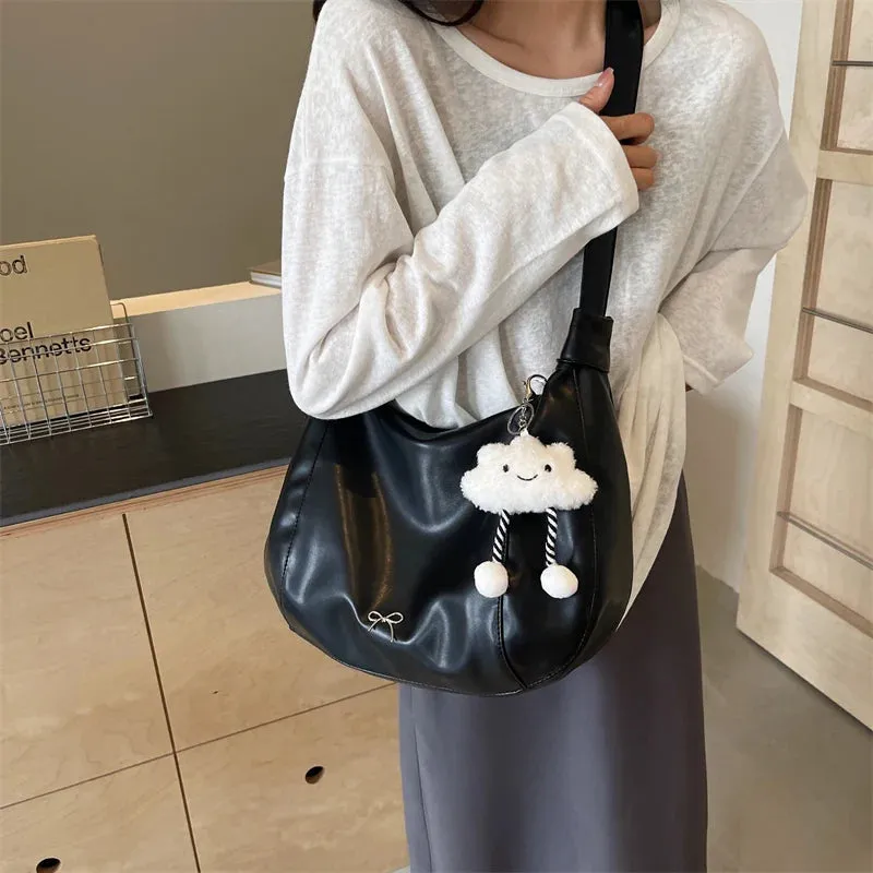 Veloria™ Appliqué Bucket Bag