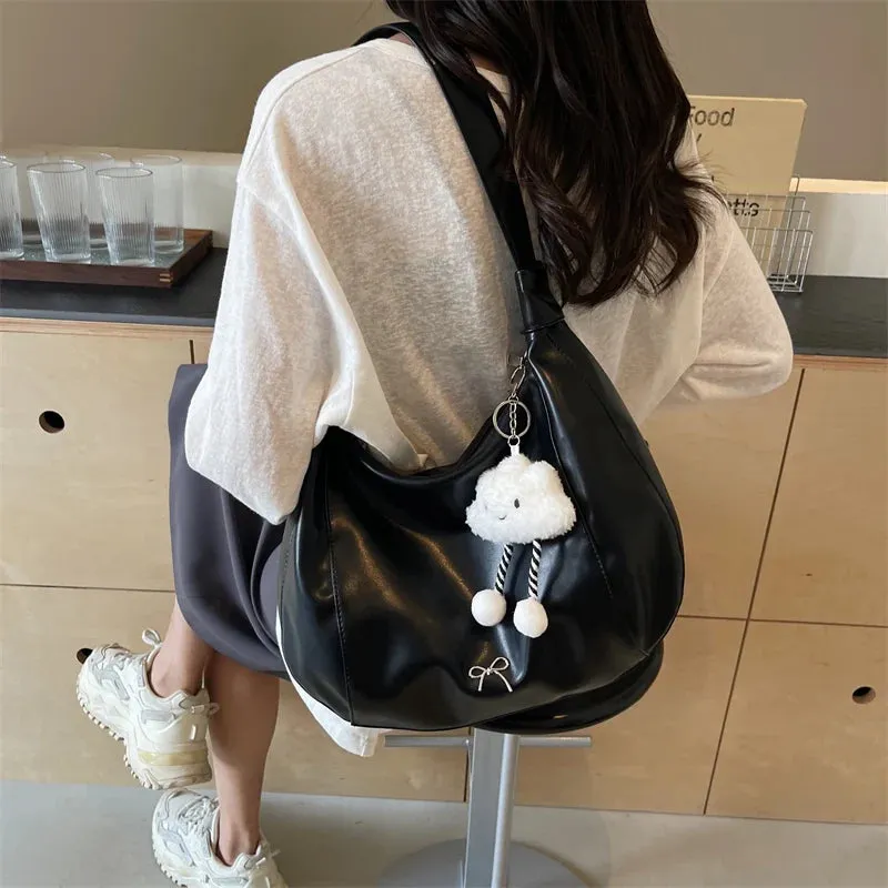 Veloria™ Appliqué Bucket Bag